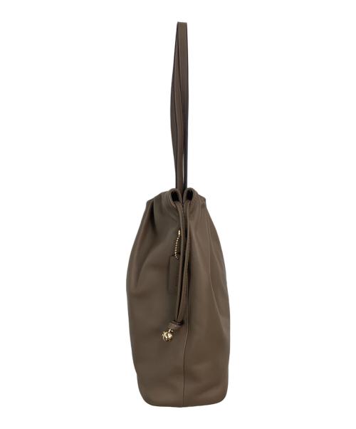 COACH（コーチ）COACH (コーチ) フェイ ドローストリングトート バッグ ベージュの古着・服飾アイテム