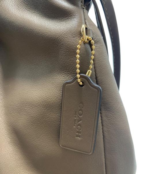 COACH（コーチ）COACH (コーチ) フェイ ドローストリングトート バッグ ベージュの古着・服飾アイテム