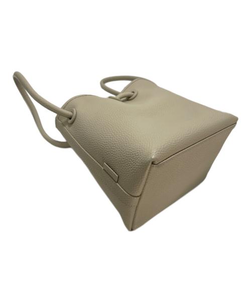 VASIC（ヴァジック）VASIC (ヴァジック) 巾着バッグ アイボリーの古着・服飾アイテム