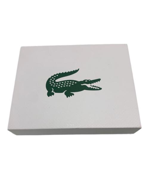 LACOSTE（ラコステ）LACOSTE (ラコステ) ラウンドジップミニウォレット ブルー系の古着・服飾アイテム
