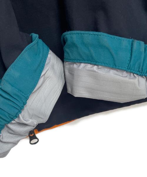MOUNTAIN HARD WEAR（マウンテンハードウェア）MOUNTAIN HARD WEAR (マウンテンハードウェア) マウンテンパーカー ブラック×オレンジ サイズ:Sの古着・服飾アイテム