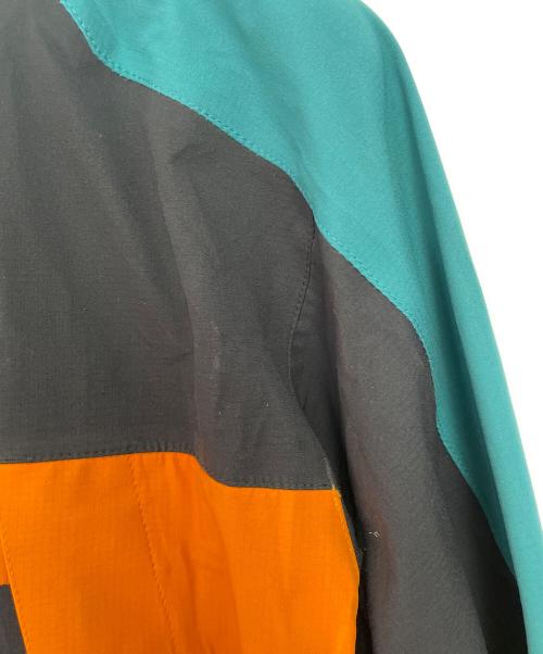 MOUNTAIN HARD WEAR（マウンテンハードウェア）MOUNTAIN HARD WEAR (マウンテンハードウェア) マウンテンパーカー ブラック×オレンジ サイズ:Sの古着・服飾アイテム