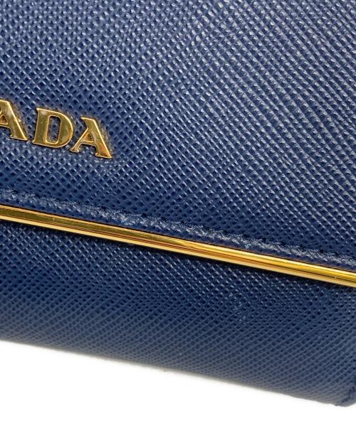 PRADA（プラダ）PRADA (プラダ) サフィアーノ メタル 2つ折り財布 ブルー×ゴールドの古着・服飾アイテム