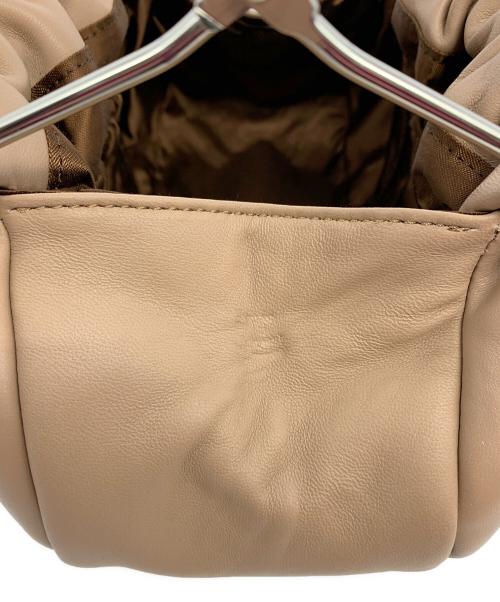傳濱野（デンハマノ）傳濱野 (デンハマノ) がま口ハンドバッグ ベージュの古着・服飾アイテム