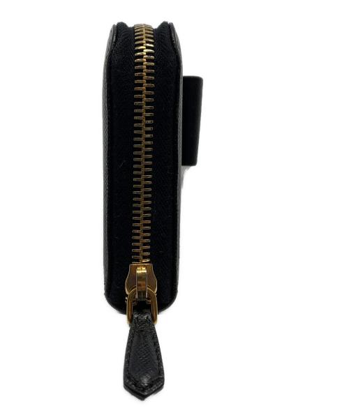 PRADA（プラダ）PRADA (プラダ) サフィアーノ ラウンドファスナーリボンウォレット ブラックの古着・服飾アイテム