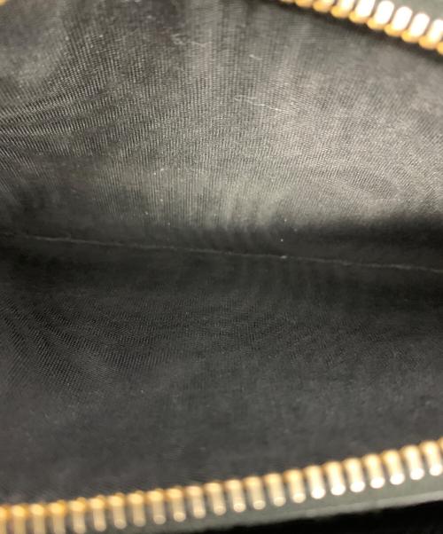 PRADA（プラダ）PRADA (プラダ) サフィアーノ ラウンドファスナーリボンウォレット ブラックの古着・服飾アイテム