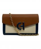 COLE HAANコールハーン）の古着「オーバーサイズクロージャーフォンケース」｜ブラウン×ネイビー