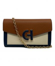 COLE HAAN（コールハーン）の古着「オーバーサイズクロージャーフォンケース」｜ブラウン×ネイビー