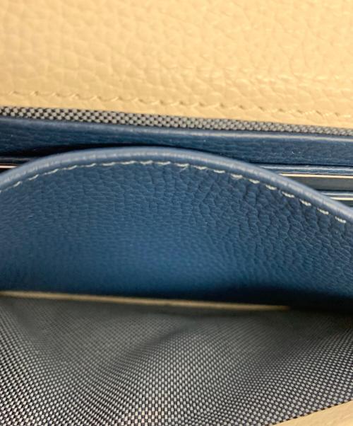 COLE HAAN（コールハーン）COLE HAAN (コールハーン) オーバーサイズクロージャーフォンケース ブラウン×ネイビーの古着・服飾アイテム