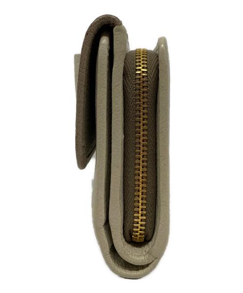 MIU MIU（ミュウミュウ）MIU MIU (ミュウミュウ) 2つ折り財布の古着・服飾アイテム