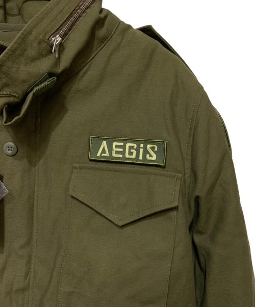 アリス・ギア・アイリス（アリス・ギア・アイリス）アリス・ギア・アイリス (アリス・ギア・アイリス) M65ジャケット オリーブ サイズ:XL 未使用品の古着・服飾アイテム