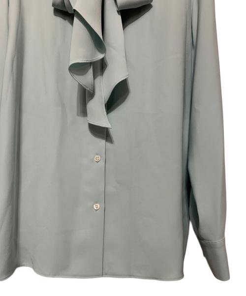 theory luxe（セオリーリュクス）theory luxe (セオリーリュクス) MARVINE SAYLIE Blouse スカイブルー サイズ:040 未使用品の古着・服飾アイテム