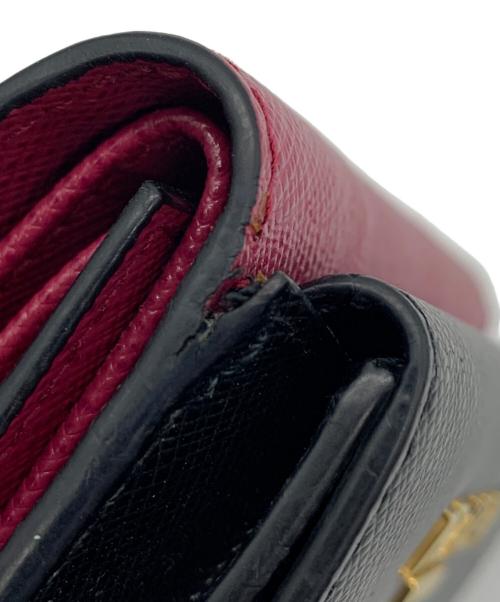 PRADA（プラダ）PRADA (プラダ) サフィアーノレザー3つ折り財布 ブラック×ピンクの古着・服飾アイテム