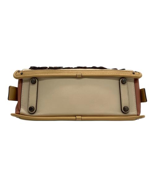 COACH（コーチ）COACH (コーチ) ドリーマーウィズバタフライバッグ ベージュ×ブラウン×ピンクの古着・服飾アイテム