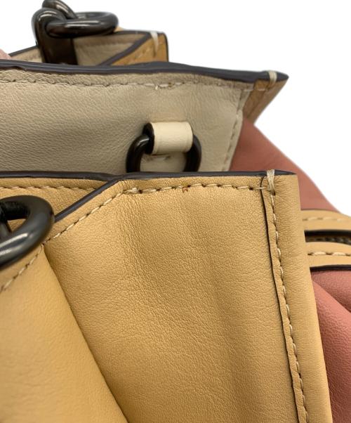 COACH（コーチ）COACH (コーチ) ドリーマーウィズバタフライバッグ ベージュ×ブラウン×ピンクの古着・服飾アイテム