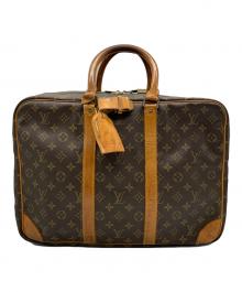 LOUIS VUITTON（ルイ ヴィトン）の古着「トラベルバッグ」｜ブラウン