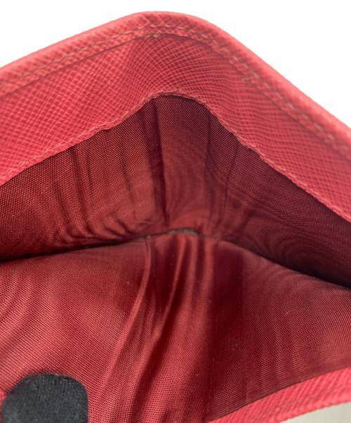 PRADA（プラダ）PRADA (プラダ) サフィアーノ コンパクトウォレット ピンクの古着・服飾アイテム