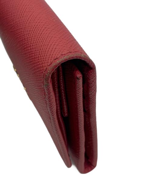 PRADA（プラダ）PRADA (プラダ) サフィアーノ コンパクトウォレット ピンクの古着・服飾アイテム