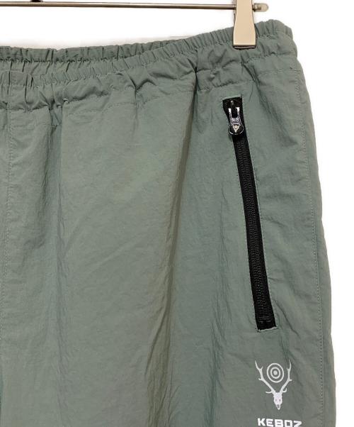South2 West8（サウスツー ウエストエイト）south2 west8 (サウスツー ウエストエイト) KEBOZ (ケボズ) ナイロンパンツ グリーン サイズ:Ｌの古着・服飾アイテム
