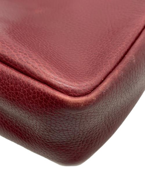 murt de cartier（マストドゥカルティエ）murt de cartier (マストドゥカルティエ) クラッチバッグ レッドの古着・服飾アイテム