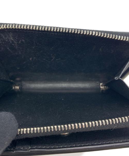 SAINT LAURENT（サンローラン）Saint Laurent (サンローラン) カサンドラ リザード柄 ジップウォレット  ブラックの古着・服飾アイテム