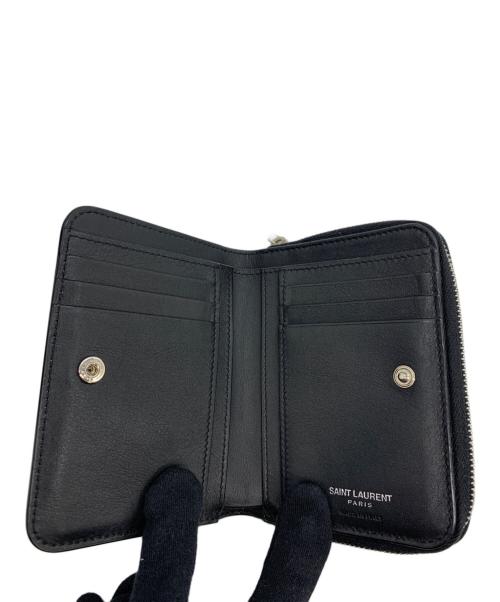 SAINT LAURENT（サンローラン）Saint Laurent (サンローラン) カサンドラ リザード柄 ジップウォレット  ブラックの古着・服飾アイテム