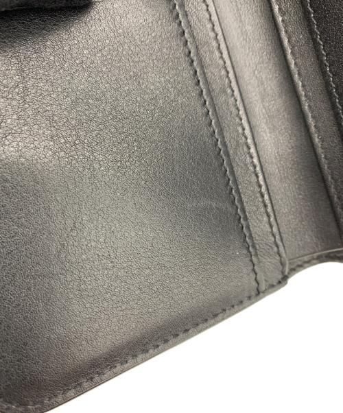 SAINT LAURENT（サンローラン）Saint Laurent (サンローラン) カサンドラ リザード柄 ジップウォレット  ブラックの古着・服飾アイテム