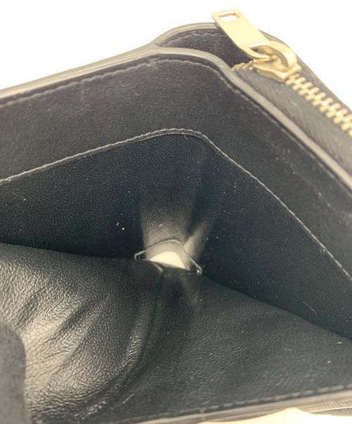 SAINT LAURENT（サンローラン）Saint Laurent (サンローラン) カサンドラ リザード柄 ジップウォレット  ブラックの古着・服飾アイテム