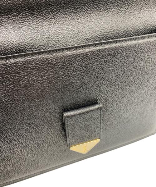 Yves Saint Laurent（イヴサンローラン）Yves Saint Laurent (イヴサンローラン) クラッチバッグ ブラック×ゴールドの古着・服飾アイテム