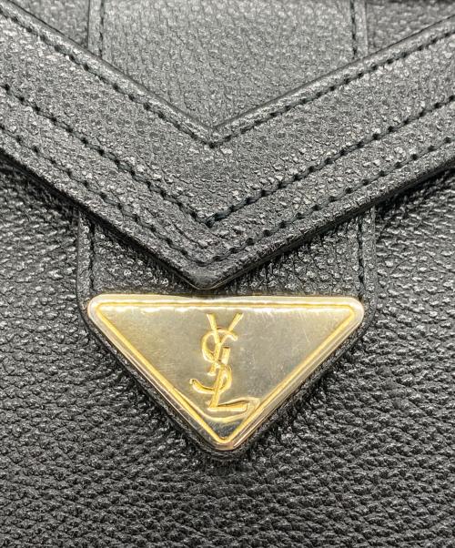 Yves Saint Laurent（イヴサンローラン）Yves Saint Laurent (イヴサンローラン) クラッチバッグ ブラック×ゴールドの古着・服飾アイテム