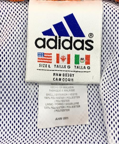 adidas（アディダス）adidas (アディダス) ナイロンパーカー ブルー×オレンジ サイズ:Ｌの古着・服飾アイテム