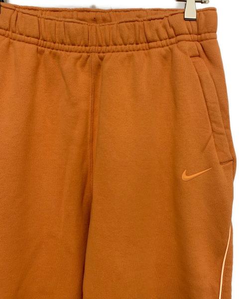 NIKE（ナイキ）NIKE (ナイキ) PANT FLC HOT CURRY オレンジ サイズ:Sの古着・服飾アイテム
