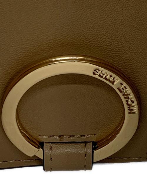 MICHAEL KORS（マイケルコース）MICHAEL KORS (マイケルコース) JET SET TRAVEL ベージュの古着・服飾アイテム
