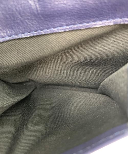 COLE HAAN（コールハーン）COLE HAAN (コールハーン) スローン バイフォールド ダブルコイン ネイビーの古着・服飾アイテム