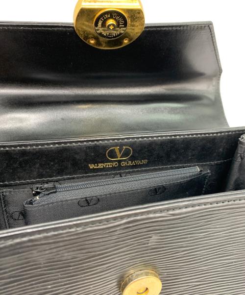VALENTINO GARAVANI（ヴァレンティノ・ガラヴァーニ）VALENTINO GARAVANI (ヴァレンティノ・ガラヴァーニ) ハンドバッグ ブラック×ゴールドの古着・服飾アイテム