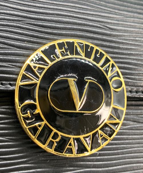 VALENTINO GARAVANI（ヴァレンティノ・ガラヴァーニ）VALENTINO GARAVANI (ヴァレンティノ・ガラヴァーニ) ハンドバッグ ブラック×ゴールドの古着・服飾アイテム