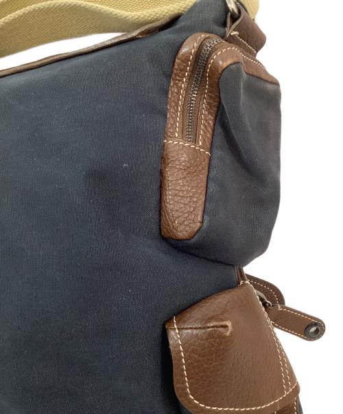 TOD'S（トッズ）TOD'S (トッズ) フラップショルダーバッグ ネイビー×ブラウンの古着・服飾アイテム