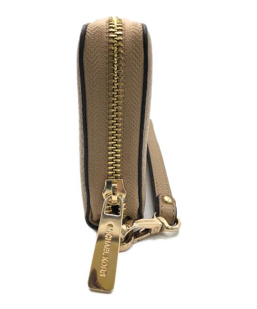 MICHAEL KORS（マイケル・コース）MICHAEL KORS (マイケルコース) 長財布 ベージュの古着・服飾アイテム