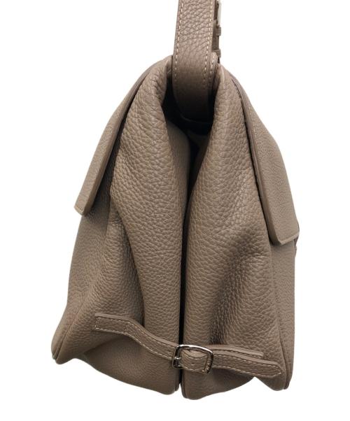 ACATE（アカーテ）ACATE (アカーテ) ポストマンバッグ ベージュの古着・服飾アイテム