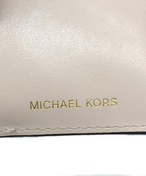MICHAEL KORS（マイケル・コース）MICHAEL KORS (マイケルコース) 3つ折り財布 ピンクベージュの古着・服飾アイテム