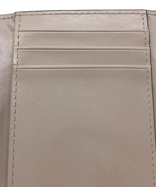 MICHAEL KORS（マイケル・コース）MICHAEL KORS (マイケルコース) 3つ折り財布 ピンクベージュの古着・服飾アイテム