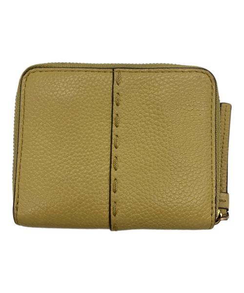 TORY BURCH（トリーバーチ）TORY BURCH (トリーバーチ) 2つ折り財布 ベージュの古着・服飾アイテム