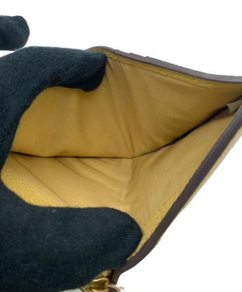 TORY BURCH（トリーバーチ）TORY BURCH (トリーバーチ) 2つ折り財布 ベージュの古着・服飾アイテム