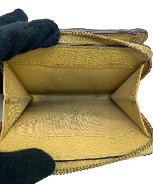 TORY BURCH（トリーバーチ）TORY BURCH (トリーバーチ) 2つ折り財布 ベージュの古着・服飾アイテム