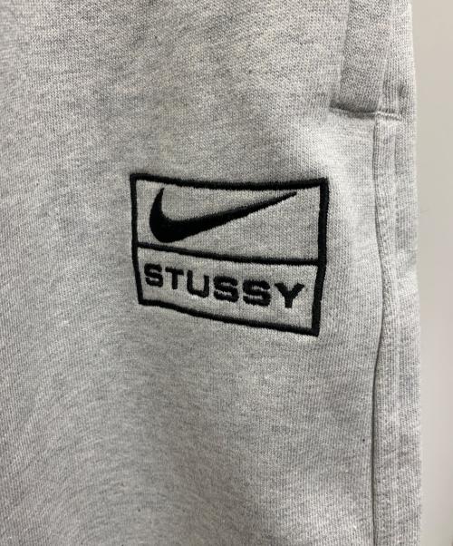 NIKE（ナイキ）NIKE (ナイキ) stussy (ステューシー) スウェットパンツ ライトグレー サイズ:XL 未使用品の古着・服飾アイテム