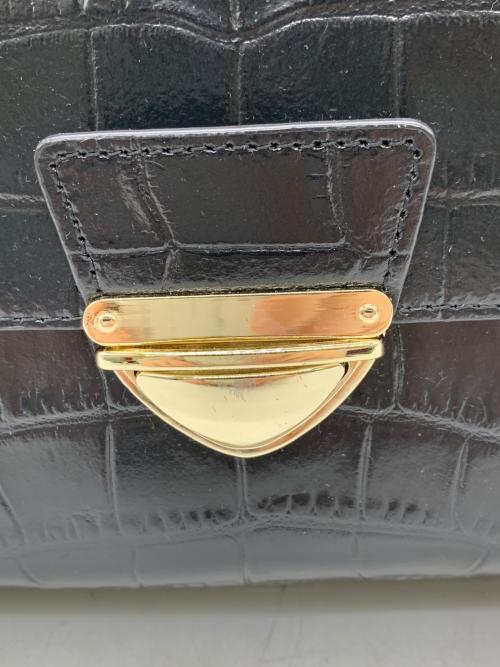 eat in the closet（イートインザクローゼット）eat in the closet (イートインザクローゼット) ショルダーバッグ ブラック×レッドの古着・服飾アイテム