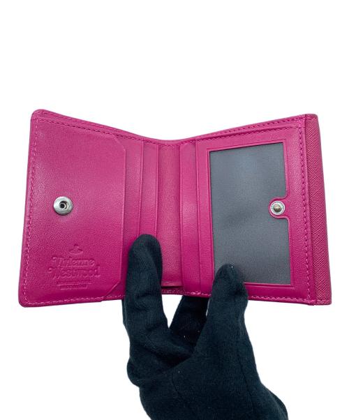 Vivienne Westwood（ヴィヴィアンウエストウッド）Vivienne Westwood (ヴィヴィアンウエストウッド) 2つ折り財布 ピンクの古着・服飾アイテム