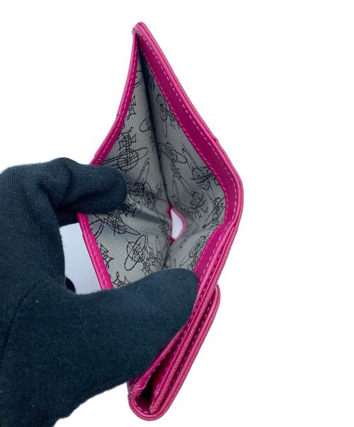 Vivienne Westwood（ヴィヴィアンウエストウッド）Vivienne Westwood (ヴィヴィアンウエストウッド) 2つ折り財布 ピンクの古着・服飾アイテム