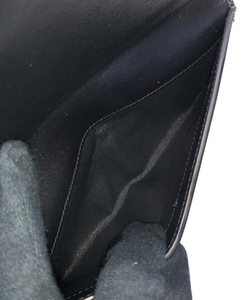 Saint Laurent Paris（サンローランパリ）Saint Laurent Paris (サンローランパリ) 長財布 ブラック×ホワイトの古着・服飾アイテム