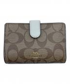 COACHコーチ）の古着「2つ折り財布」｜ベージュ